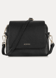 Discover the AJEES black leather crossbody bag for women. Elegant, lightweight, and spacious with a stylish flap design for everyday use.