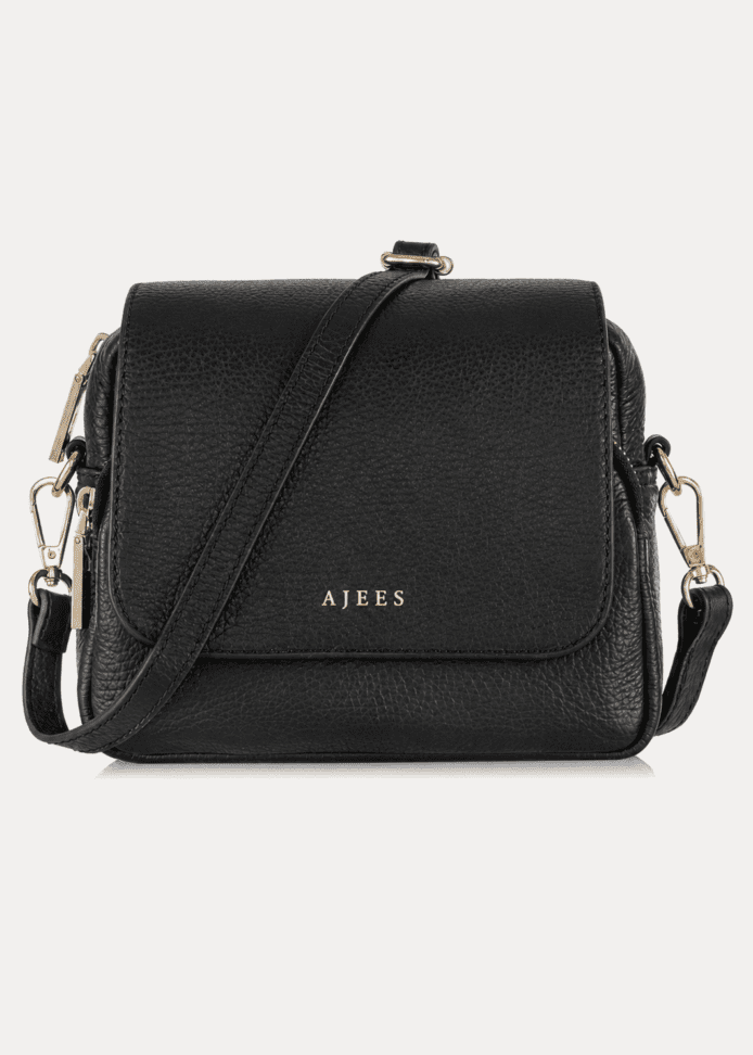 Discover the AJEES black leather crossbody bag for women. Elegant, lightweight, and spacious with a stylish flap design for everyday use.