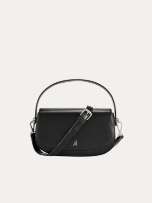 "Black premium leather saddle shoulder bag with curved handle, adjustable shoulder strap, and buckle detail - versatile women's crossbody bag"
