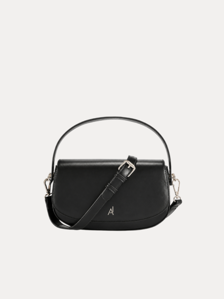 "Black premium leather saddle shoulder bag with curved handle, adjustable shoulder strap, and buckle detail - versatile women's crossbody bag"