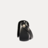 "Black premium leather saddle shoulder bag with curved handle, adjustable shoulder strap, and buckle detail - versatile women's crossbody bag"