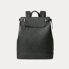 Close-up of the Noble backpack top latch closure and brass hardware detailing.
