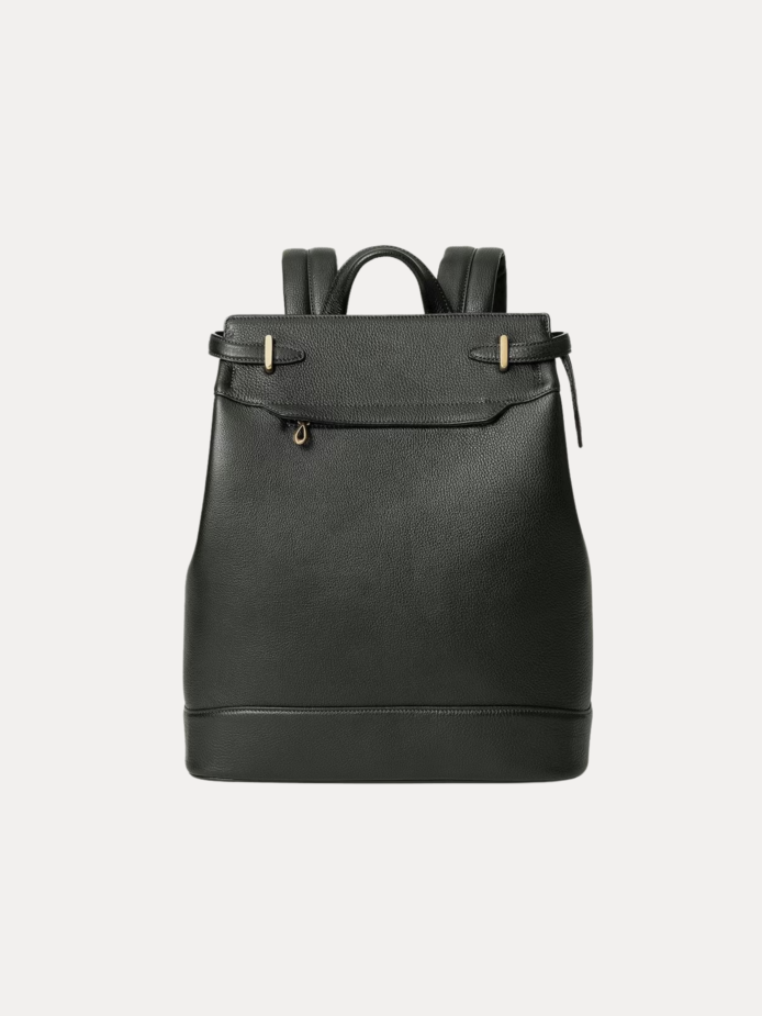Close-up of the Noble backpack top latch closure and brass hardware detailing.