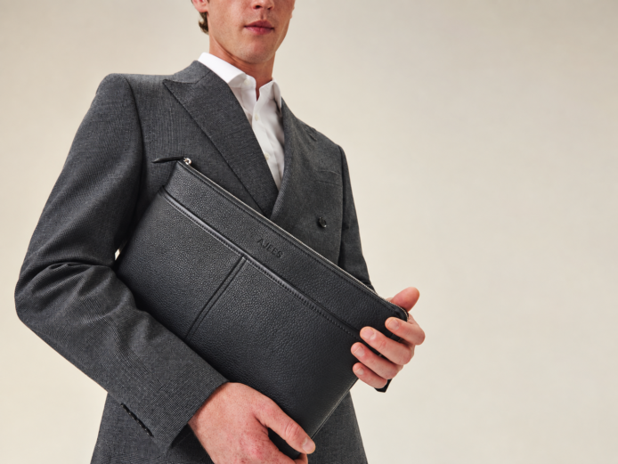 Delsaro black leather travel bag by AJEES Leather with minimalist design and premium textured leather.