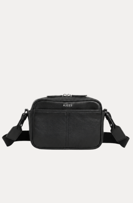 Black leather Daven Travel Bag crossbody with adjustable strap