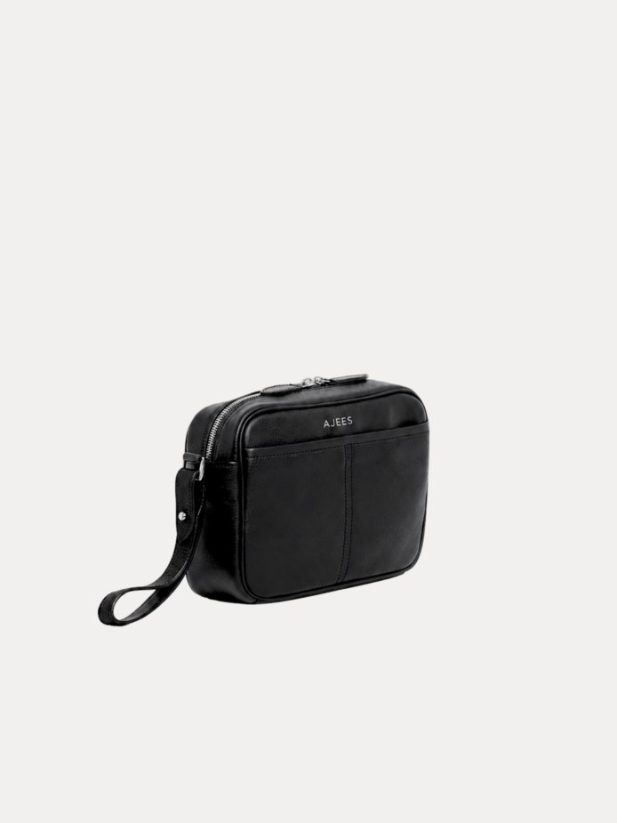 Black leather Daven Travel Bag crossbody with adjustable strap