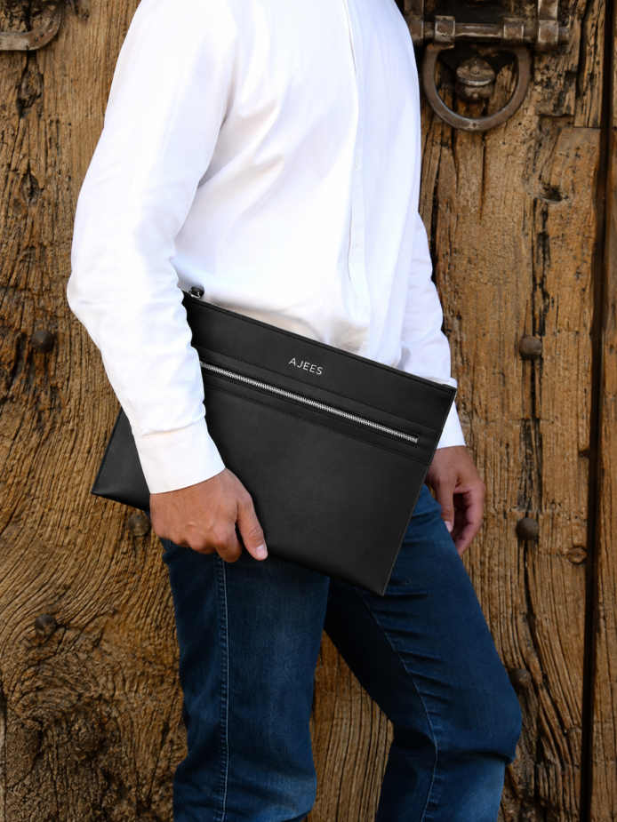 Black leather Iron Travel Bag with front zip pocket by AJEES