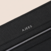 Black leather Iron Travel Bag with front zip pocket by AJEES