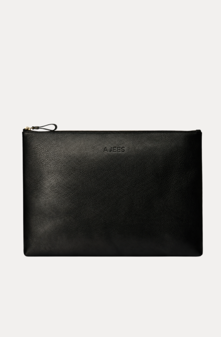 Black leather Late laptop bag with gold zipper and embossed AJEES logo