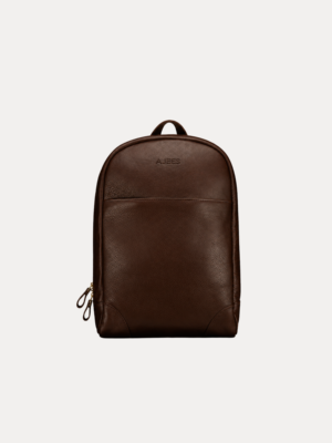 Image 1 (front view): Zenvik brown leather backpack with embossed AJEES logo, brass zippers and top carry handle