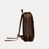Image 1 (front view): Zenvik brown leather backpack with embossed AJEES logo, brass zippers and top carry handle