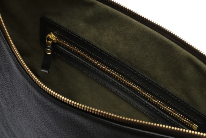 Black leather Late laptop bag with gold zipper and embossed AJEES logo
